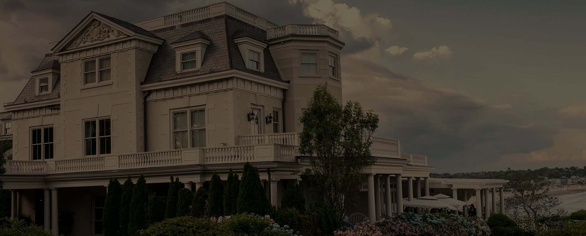 The Chanler at Cliff Walk, its gardens at dusk